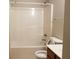 Bathroom featuring a shower and bathtub combination with a white toilet at 1059 Sims Sw St, Atlanta, GA 30310