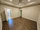Spacious bedroom featuring wood-look flooring, a ceiling fan, and recessed lighting at 1059 Sims Sw St, Atlanta, GA 30310