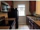 This cozy kitchen has stainless steel appliances and granite countertops at 1059 Sims Sw St, Atlanta, GA 30310