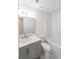 Bright bathroom featuring a modern vanity, patterned tile floor, and shower over tub at 2196 Sandell Sw Trl, Marietta, GA 30008