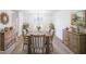 Bright dining room with wooden table, chairs, buffet, and decor at 2196 Sandell Sw Trl, Marietta, GA 30008