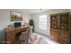 Bright home office with desk, chair, hutch, and natural light at 2196 Sandell Sw Trl, Marietta, GA 30008