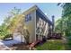 Backyard view of home showing multi-tiered deck and walk out basement at 2088 Hedgewood Trce, Lawrenceville, GA 30043