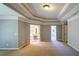 Spacious main bedroom featuring tray ceilings and ensuite bath access at 2088 Hedgewood Trce, Lawrenceville, GA 30043