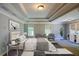 Relaxing main bedroom with sitting area, natural light, and neutral tones at 2088 Hedgewood Trce, Lawrenceville, GA 30043