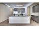 Bright kitchen features stainless appliances, granite countertops and a spacious island at 3082 Cedar Glade Ne Ln, Buford, GA 30519