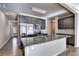Modern kitchen with stainless steel appliances, granite countertops, and ample cabinet space at 3082 Cedar Glade Ne Ln, Buford, GA 30519