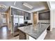 Modern kitchen with stainless steel appliances, granite countertops, and ample cabinet space at 3082 Cedar Glade Ne Ln, Buford, GA 30519