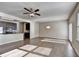 Open living space adjacent to the kitchen boasts hardwood floors and ample sunlight at 3082 Cedar Glade Ne Ln, Buford, GA 30519