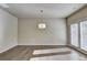 Bright living room featuring neutral walls and doors to the back deck at 3082 Cedar Glade Ne Ln, Buford, GA 30519