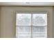 Bedroom with a window with blinds that brings in natural light at 3082 Cedar Glade Ne Ln, Buford, GA 30519