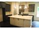 Modern kitchen with gray cabinets, white countertops, a large island, and stainless steel appliances at 127 Old Alabama Se Rd, Emerson, GA 30137