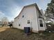 Exterior view of home featuring yard and central air conditioning unit at 2625 Thunder Basin Way, Douglasville, GA 30135