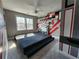 Podcast-themed bedroom with unique wall designs and a tiered platform bed, ready for creativity at 3794 Allegretto Cir, Atlanta, GA 30339