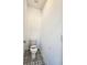 Enclosed toilet room features decorative tile floor at 3794 Allegretto Cir, Atlanta, GA 30339