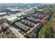 An aerial view of a townhome community featuring ample parking and mature landscaping at 6520 Roswell Rd # 74, Atlanta, GA 30328