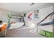 Bright bedroom featuring carpet, Spiderman decor, bunk beds and a basketball hoop at 6520 Roswell Rd # 74, Atlanta, GA 30328