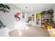 Bright bedroom featuring carpet, Spiderman decor and a basketball hoop at 6520 Roswell Rd # 74, Atlanta, GA 30328