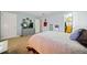 Large bedroom with carpet, large television, and closet at 6520 Roswell Rd # 74, Atlanta, GA 30328
