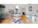 Dining area with hardwood floors and a cabinet to store decorations and glasses at 6520 Roswell Rd # 74, Atlanta, GA 30328