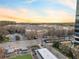 Scenic aerial perspective capturing Villa Sonoma's sprawling layout against a vibrant sunset backdrop at 10 Perimeter Summit Ne Blvd # 2405, Atlanta, GA 30319