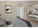 Bedroom featuring neutral walls, closet with mirrored doors, decorative art, and ceiling fan at 10 Perimeter Summit Ne Blvd # 2405, Atlanta, GA 30319