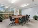 Bright conference room with a large table, comfortable seating, and picturesque outdoor views at 10 Perimeter Summit Ne Blvd # 2405, Atlanta, GA 30319