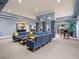 Inviting lounge with cozy seating, stylish decor, and a view of the kitchenette and doorway at 10 Perimeter Summit Ne Blvd # 2405, Atlanta, GA 30319