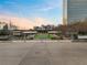 Inviting outdoor space with manicured lawn, perfect for relaxation and entertainment with a skyline backdrop at 10 Perimeter Summit Ne Blvd # 2405, Atlanta, GA 30319