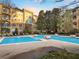 A scenic pool surrounded by lounge chairs at 10 Perimeter Summit Ne Blvd # 2405, Atlanta, GA 30319