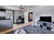 Large bedroom with an en suite bath, bunk beds, a study space, and hardwood flooring at 3261 Turtle Lake Se Ct, Marietta, GA 30067
