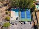 Aerial view of the community pool and tennis courts featuring meticulously maintained facilities and ample parking at 3261 Turtle Lake Se Ct, Marietta, GA 30067