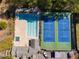 Overhead view of community amenities: a pool, tennis courts, and clubhouse, promising leisure and recreation at 3261 Turtle Lake Se Ct, Marietta, GA 30067