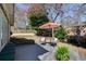 Relax on the spacious deck with comfortable seating, overlooking the lush backyard at 3261 Turtle Lake Se Ct, Marietta, GA 30067