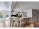 Open kitchen with a breakfast bar and backyard views at 3261 Turtle Lake Se Ct, Marietta, GA 30067