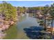 Beautiful lake view surrounded by lush green trees, creating a serene and private setting at 3261 Turtle Lake Se Ct, Marietta, GA 30067