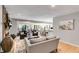 Spacious living room with stone fireplace and lots of natural light at 3261 Turtle Lake Se Ct, Marietta, GA 30067