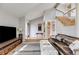 Bright living room featuring hardwood floors, a comfortable sofa, and natural light at 3261 Turtle Lake Se Ct, Marietta, GA 30067