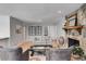 Cozy living room with stone fireplace, light gray walls, and comfortable seating at 3261 Turtle Lake Se Ct, Marietta, GA 30067