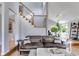 Comfortable living room showcases a staircase, and neutral tones at 3261 Turtle Lake Se Ct, Marietta, GA 30067