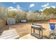 Large backyard features a storage shed, a gazebo, grill, and a picnic table at 7207 Brigidoon Rose, Douglasville, GA 30134
