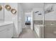 Bathroom featuring a soaking tub, separate shower, and dual sinks at 7207 Brigidoon Rose, Douglasville, GA 30134