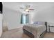 Nicely appointed bedroom featuring a ceiling fan and ample natural light at 7207 Brigidoon Rose, Douglasville, GA 30134