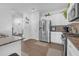 Kitchen with stainless steel appliances and granite counters at 7207 Brigidoon Rose, Douglasville, GA 30134