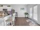 Bright eat-in kitchen area with hardwood floors and breakfast bar seating at 7207 Brigidoon Rose, Douglasville, GA 30134