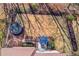 An aerial view of the backyard, showcasing the patio and trampoline at 1175 Lamont Cir, Dacula, GA 30019