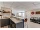 Spacious basement featuring wet bar, media chairs, and a comfortable seating area at 1175 Lamont Cir, Dacula, GA 30019