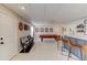 Finished basement featuring a wet bar, theater seating and a pool table at 1175 Lamont Cir, Dacula, GA 30019