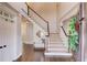 Elegant foyer features a staircase, hardwood floors, and ample natural light at 1175 Lamont Cir, Dacula, GA 30019