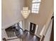 Foyer with a beautiful chandelier and elegant staircase at 1175 Lamont Cir, Dacula, GA 30019